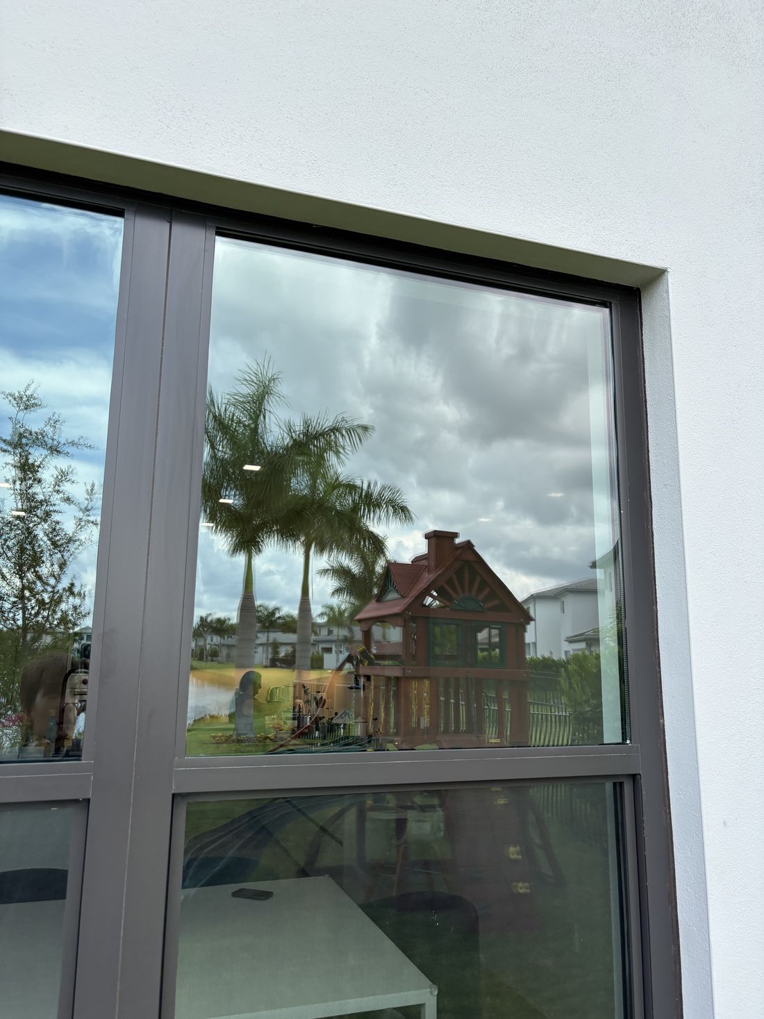 Finished upper window with palm reflection