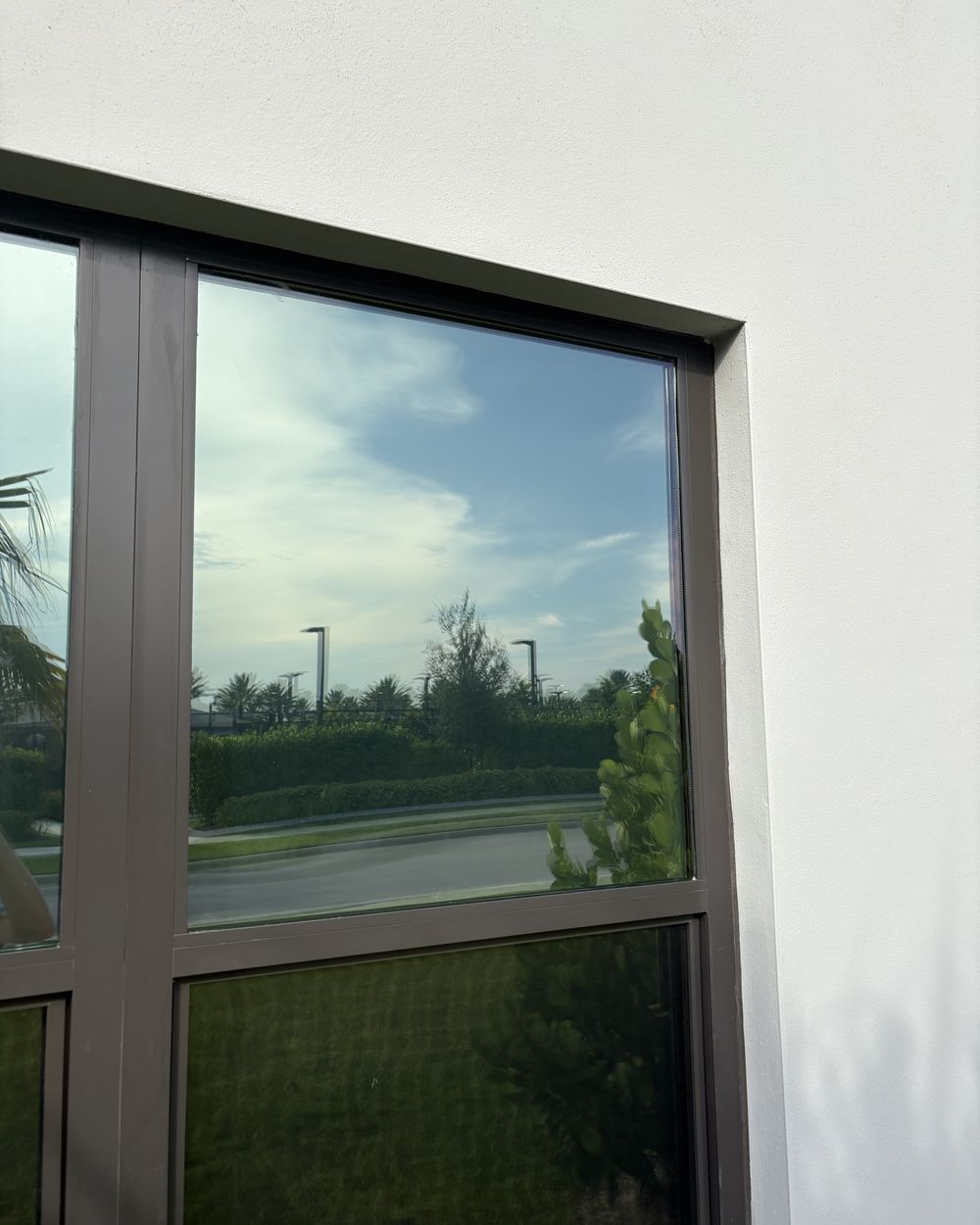 Finished window with a clear sky reflection